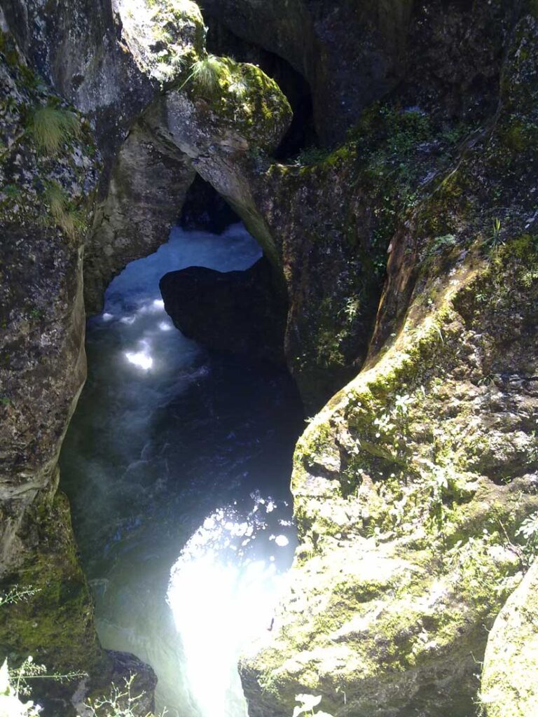 Devil’s Throat Cave in Bulgaria with underground waterfall and dark mysterious interior